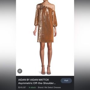 Gold sequined off the shoulder dress